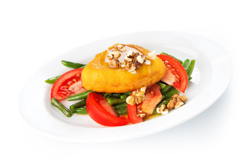 Restaurant food isolated - breaded goat cheese with walnuts, hon