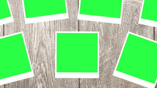 photos with a green screen on a wooden background