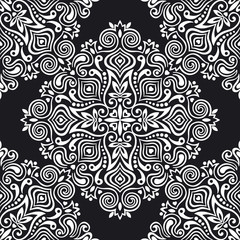 Seamless background with abstract ethnic pattern.