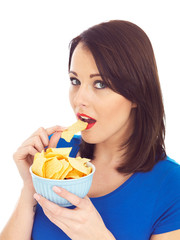 Young Woman Eating Potato Crisps