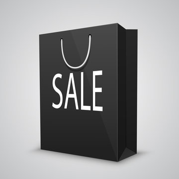 Black shopping bags with written sale