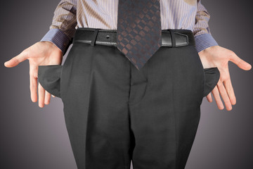 man showing empty pockets