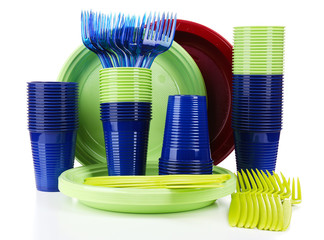 Bright plastic disposable tableware isolated on white