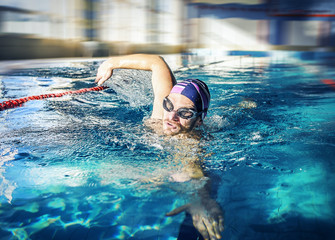 Young man swimming