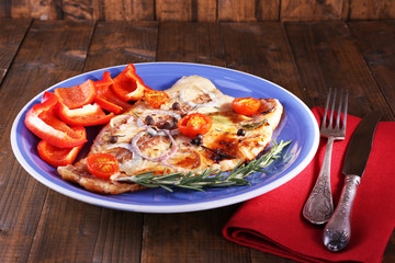 Dish of Pangasius fillet with spices and vegetables