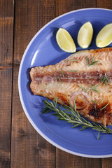 Dish of Pangasius fillet with rosemary and lime