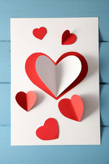Beautiful hand made post card with paper hearts