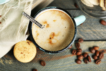 Beautiful composition with tasty cappuccino on wooden table