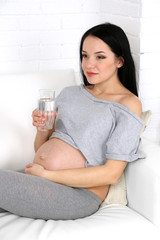 Young pregnant woman relaxing