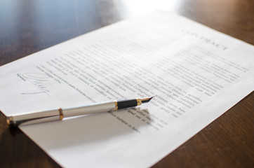 Fototapeta premium Pen on a signed contract