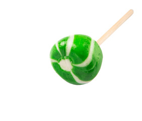 Green swirl peppermint candies over white background