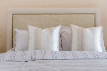 Fototapeta na wymiar luxury bedroom with pillows on bed