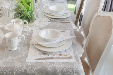 table set in white dinning room