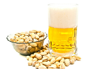 pistachios and mug of beer