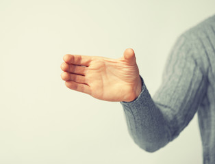 man holding imaginary object