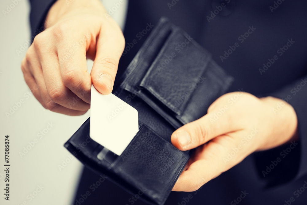 Canvas Prints man in suit holding credit card