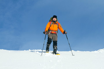 Winter hiking in snowshoes.