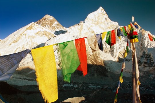 evening view of Mount Everest with buddhist prayer flags