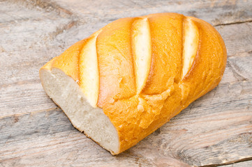 white bread on a wooden table