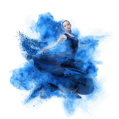 young woman dancing flamenco against explosion - obrazy, fototapety, plakaty