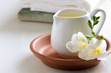 Massage oil in a jug