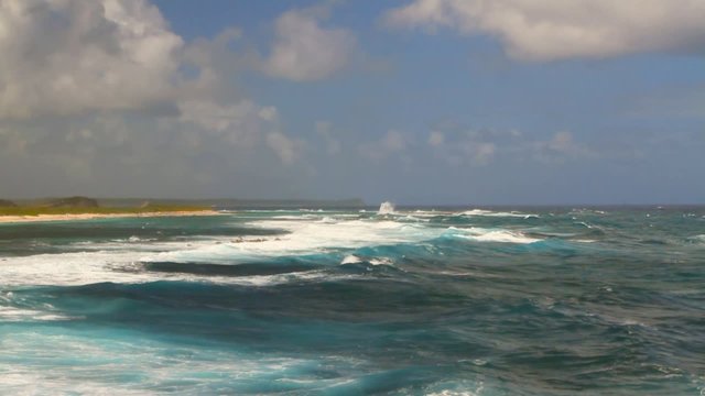 Sea waves on shoal. Anse de Shatto, Guadeloupe