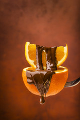 arancia con cioccolato fondente - obrazy, fototapety, plakaty
