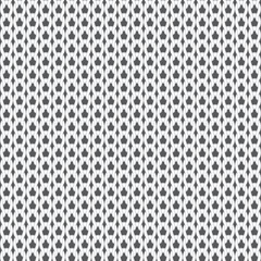 Seamless texture of knitted loops in gray shades.