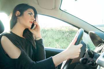 Fototapeta premium female driver with his smart phone