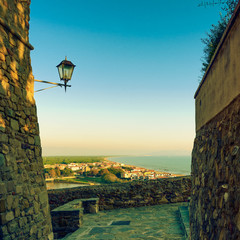 Castiglione della Pescaia, lamp and terrace sunset view on the s