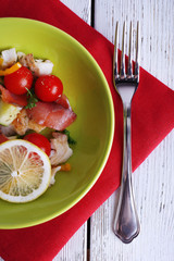 Fresh fish salad with vegetables