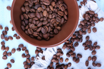 Bowl of ground coffee and coffee beans
