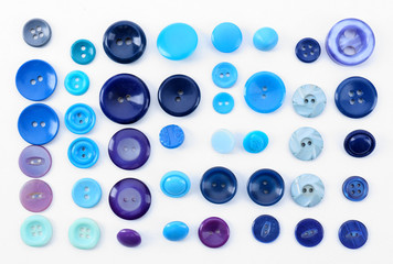 Colorful sewing buttons isolated on white