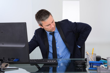 Businessman Suffering From Backpain