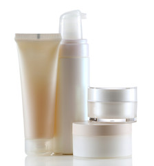 Group of cosmetic bottles isolated on white