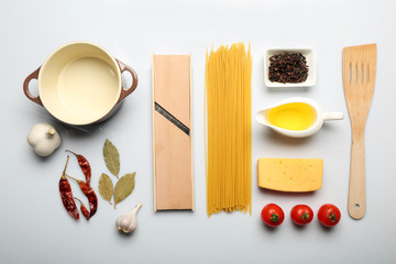 Food ingredients and kitchen utensils for cooking isolated