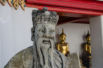 Statua del monaco al Wat Arun e Wat Pho a Bangkok