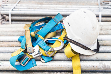 Safety helmet and harness at a construction site