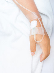 sick lady lying in hospital bed