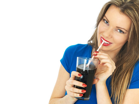 Young Woman Drinking Fizzy Cola Drink