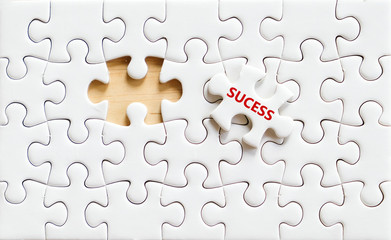 Success word on jigsaw pazzle,business concept background