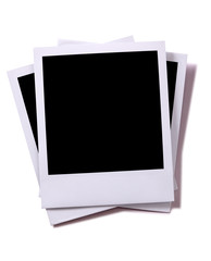 Untidy stack pile polaroid style instant camera print photo frame isolated white background with shadow