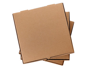 Stack of three brown pizza boxes flat top closed view isolated white background photo