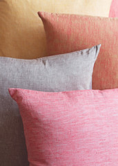 Background stack of colored cushions
