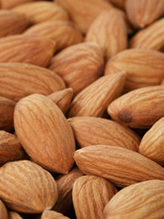 fresh almond peeled nuts background