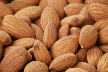 fresh almond peeled nuts background