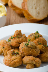 Breaded fried mushrooms with juice