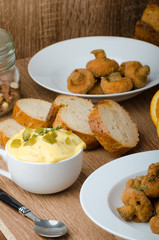 Breaded fried mushrooms with juice