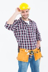 Confident handyman wearing hard hat