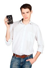 young man with retro camera isolated on white